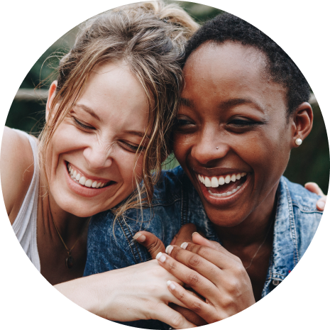 Women with brilliant smiles helped by Efferdent's Oxi-Action formula